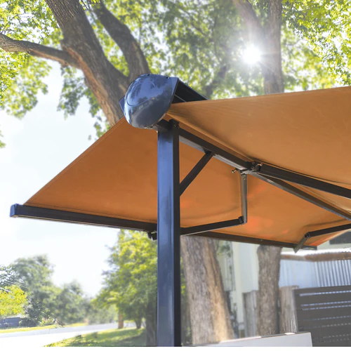 Free-standing awning system for flexible outdoor shade without wall mounting.